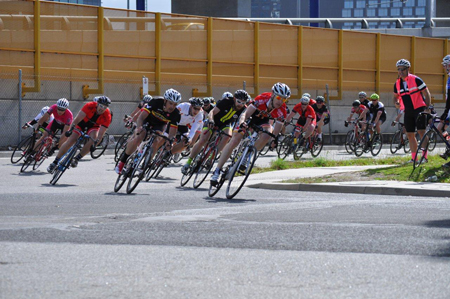 The author leads the bunch into the final corner of a Melbourne criterium race.